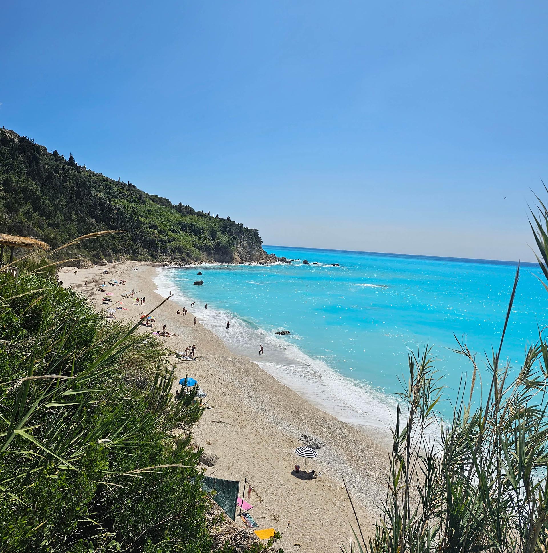 The stunning, unspoiled beauty of Avali Beach in Lefkada, with its turquoise waters and golden sands.