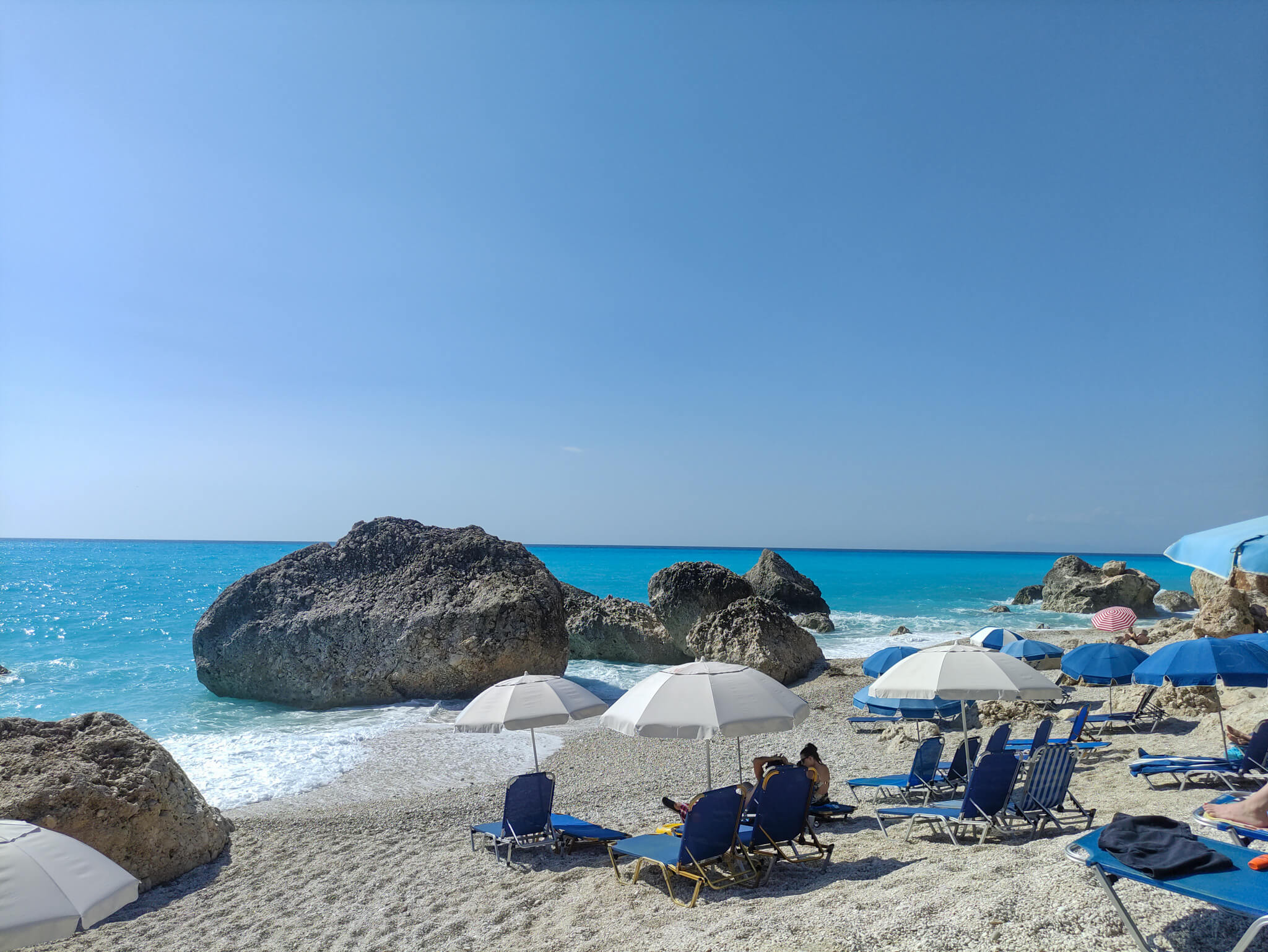 The dramatic landscape of Kavalikefta Beach, with its giant white rocks and crystal-clear turquoise sea.