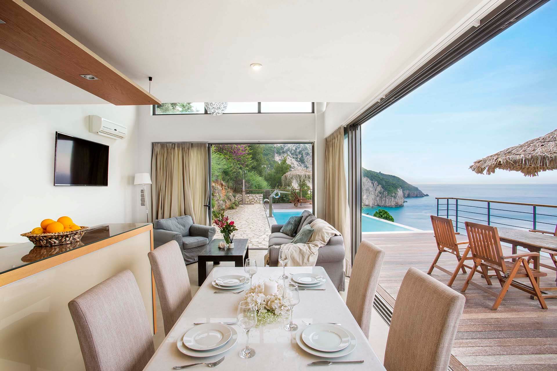 The breathtaking panoramic view of the Ionian Sea from the private pool terrace of a Milos Bay Villa, Lefkada.